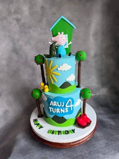 Here's a big George Pig cake for Aruj's big 4th birthday! This two-tier cake is in my signature Chocolate-Dulce de leche flavor, with all the fun, handmade fondant accents sitting on a smooth ganache finish.