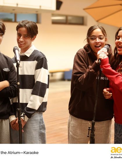 A group of friends sings a karaoke song together. These events are as much about friendship and making memories as they are about musical talent.