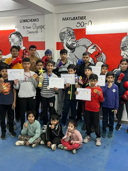 Our young champions with their medals and certificates after a successful district championship.