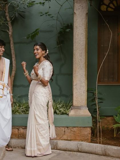 A moment of shared laughter on the steps of one of our suites. The simple, clean lines of the building allow the couple's joy to shine.