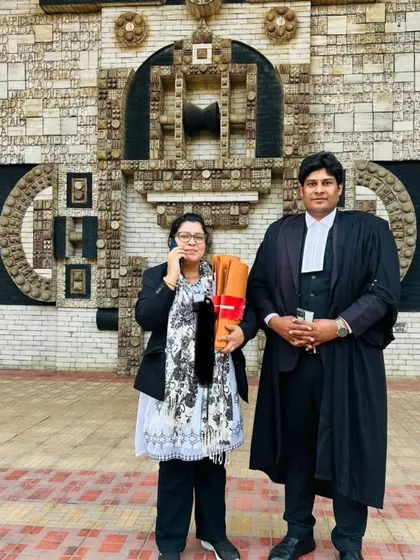 Pictured here with a fellow advocate outside the court. Collaboration and mutual respect within the legal fraternity are essential as we all work towards the common goal of justice.