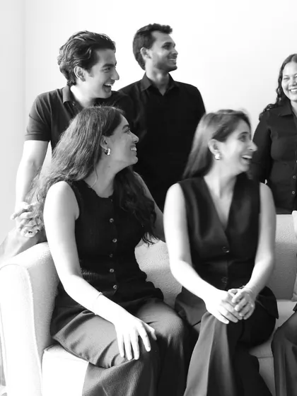 Behind every idea is a team making it real. This is a part of our crew, sharing a laugh during a studio photoshoot.