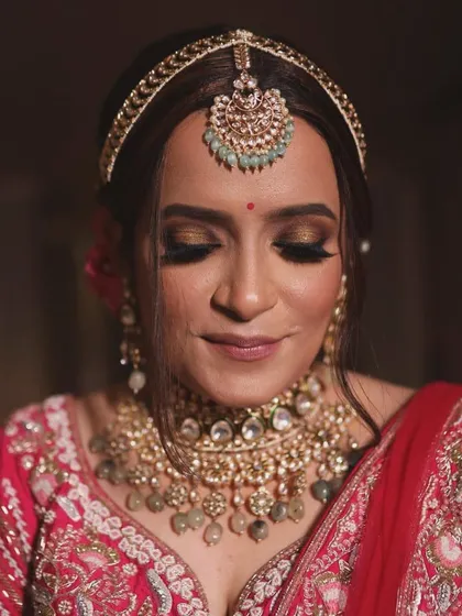A close-up on the eyes tells the whole story. I guided my student in creating this soft, smokey bridal eye with a touch of shimmer for our bride Nilofer.