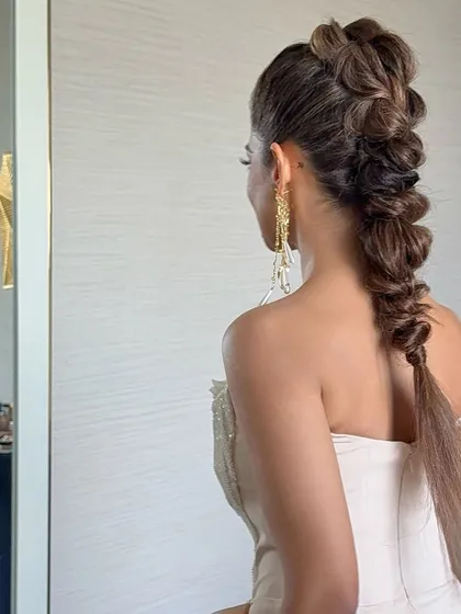 Another view of the modern, textured braid, perfect for a fashion-forward bride.