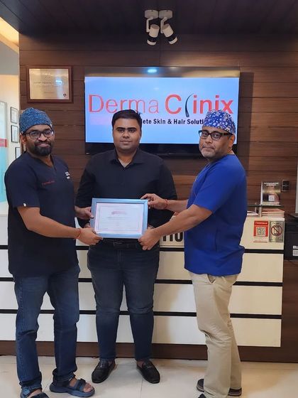 Dr. Kavish Chouhan and Dr. Amrendra Kumar presenting the fellowship certificate to Dr. Akash from Bangladesh.