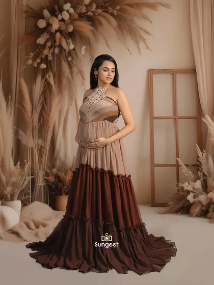 A quiet, contemplative pose against our pampas grass backdrop. We guide you through various poses to capture different moods.