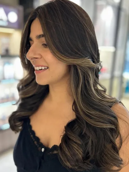 Another shot of the two-tone balayage, highlighting the bright smile and the way the color enhances her features.