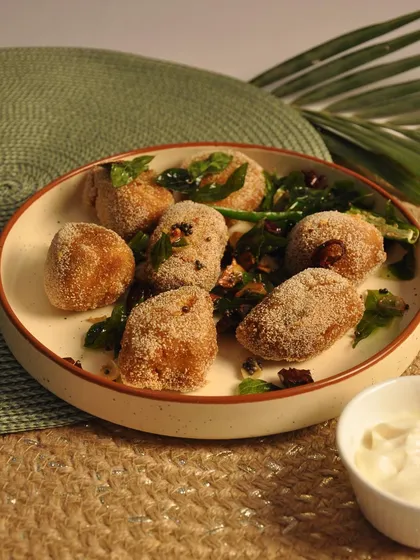 My Mushroom Rawa Fry is a coastal-inspired delight. Mushrooms are coated in a seasoned semolina mixture and fried until crispy, then tossed with curry leaves and spices for a wonderfully textured and flavorful starter.