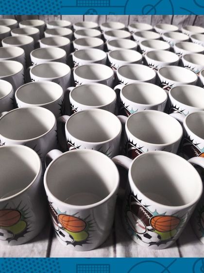 A large batch of the multi-sport themed mugs, ready for a big birthday celebration.