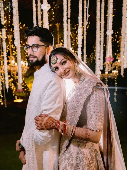 A quiet moment of connection amidst the grand celebration. For Sachi and Aayush, we created a space for them to just be together, resulting in this timeless and elegant portrait that feels as serene as their bond.