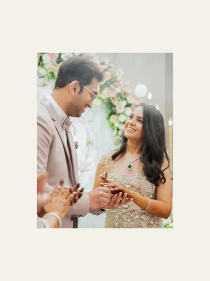 The moment of the ring exchange. The bride's happy glance at her partner as he slips on the ring is a memory filled with promise and joy.