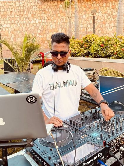 DJing a white-themed wedding event in Pushkar. I can adapt my style and music to fit any wedding theme, creating a cohesive experience.