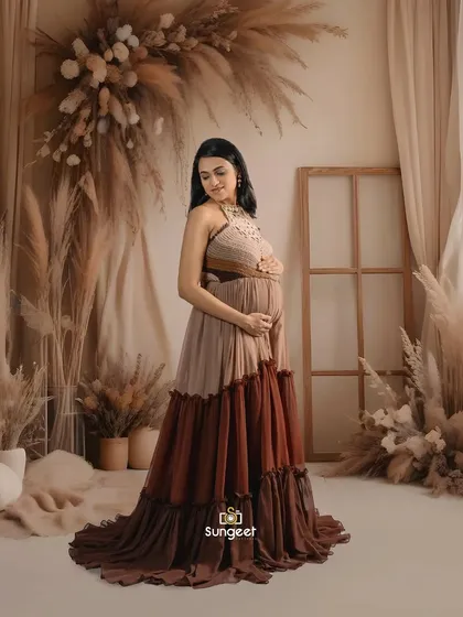 A classic standing portrait in our boho setup, highlighting the unique design of the halter-neck tiered gown.