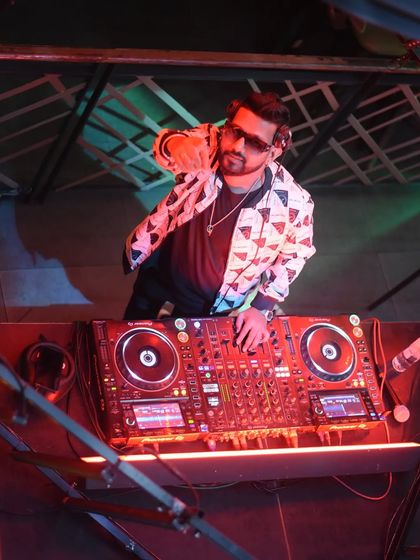 A close-up of me mixing from the cage. Time will tell your story.