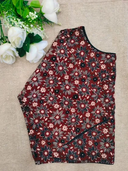 A maroon version of the floral printed cotton boatneck blouse.