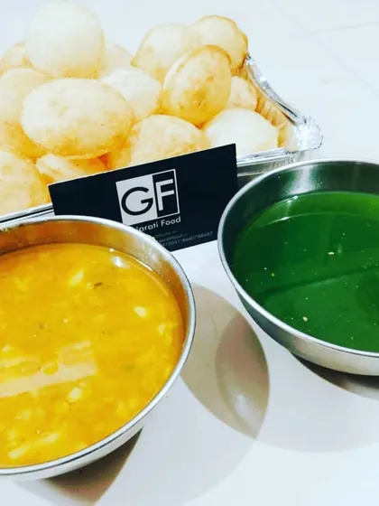 My homemade Pani Puri, a favorite street food snack. I prepare the crispy puris, the tangy mint-coriander water (pani), and the flavorful filling separately for you to assemble and enjoy fresh.