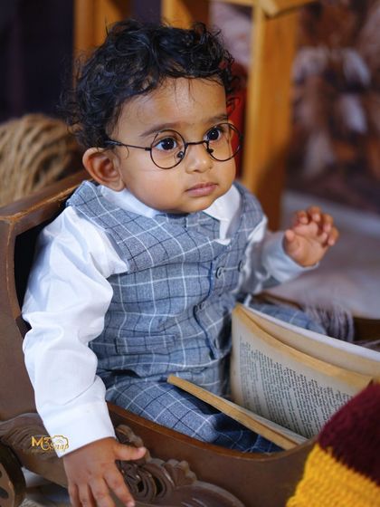 Adding round glasses for a "Harry Potter" or "little professor" vibe. Props can completely change the feel of a photo.