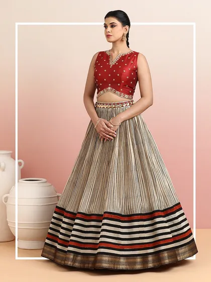 A framed shot of the striped lehenga, emphasizing its artistic and contemporary appeal.