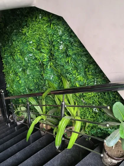Another angle of the Corfit gym entrance. The green wall contrasts beautifully with the black marble stairs and steel railings.
