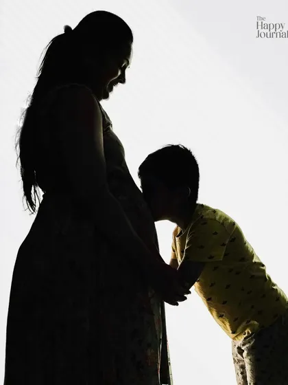 Welcoming a new baby is a family affair. I love creating these artistic silhouette portraits that beautifully capture the bond between a mother and her older child as they wait for the new arrival.