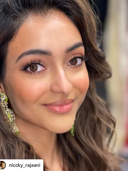 A close-up look at the flawless skin finish I aim for with every client. This peachy, glowing makeup highlights natural beauty with a fresh, dewy complexion, proving that you don't need heavy layers to achieve a perfect look.
