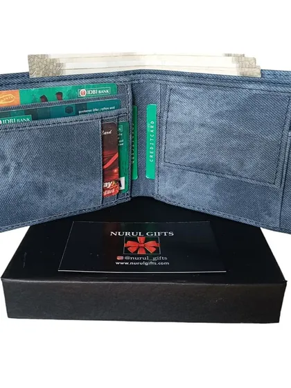 An open view of the personalized denim wallet, showing its interior with multiple card slots and a coin pocket.