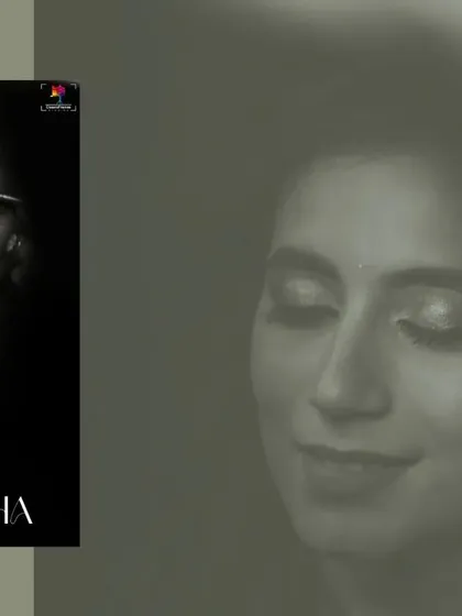A dramatic black and white portrait of the bride during her makeup session. The focus on her closed eyes and the artist's brush creates a moment of quiet anticipation.