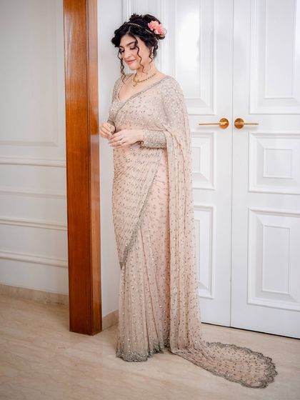 A Bridgerton-inspired makeover. This look is all about English elegance and Indian opulence, with a soft, romantic makeup style and a beautiful updo.