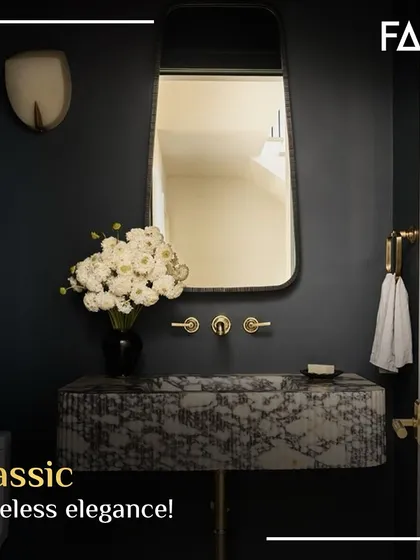 For a touch of timeless elegance, I design classic vanities like this one. The patterned pedestal sink against a dark wall, paired with gold fixtures, creates a look that is both classic and sophisticated.