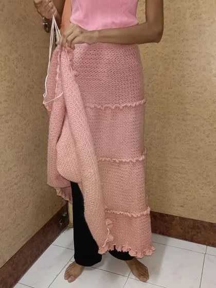 A view of the Maloi skirt being constructed, showing the different textured tiers.
