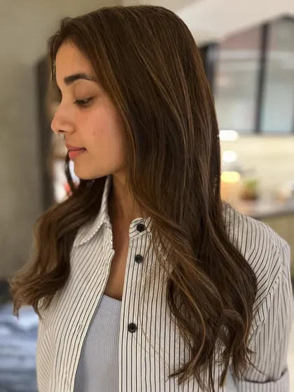 A warm-tone highlight blend using babylights. The subtle mocha brown and warm highlights create a soft, natural-looking color.