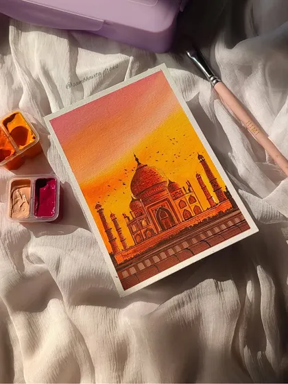 A flat lay of my Taj Mahal painting, surrounded by the gouache cups I used. The colors look so warm and inviting.
