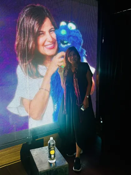 Posing by the stage after my first solo show in Bangalore. Performing for new audiences in different cities helps me keep my material fresh and relevant for diverse corporate teams.