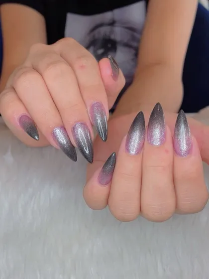 Another view of the dramatic pink-to-black ombré glitter nails.