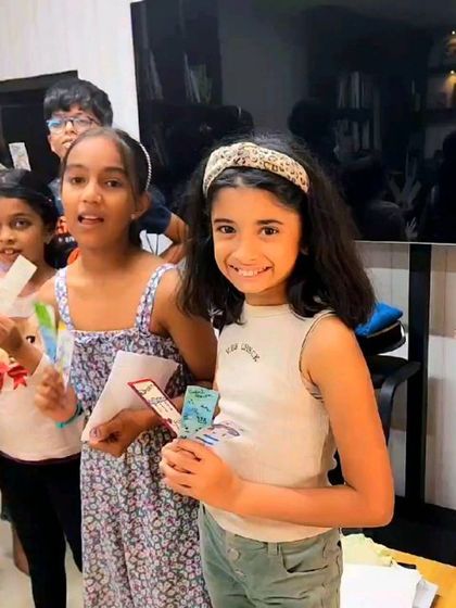 Children are so real; they don't worry about the outcome as much as they believe in having fun. Here are some of our young doodlers holding up their unique bookmark creations.