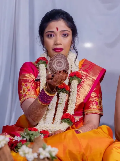 A full look at Vasuda's Varapooja makeup and styling. You can see how her nails, though simple, are an important part of her overall appearance for the ceremony.