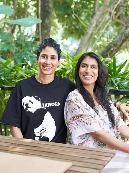 A photo of me and my co-founder, Mahalakshmi. Our shared vision is to raise awareness about natural health solutions and the power of a whole food, plant-based lifestyle.
