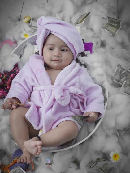 This little 'Lady Boss' is ready for business in her bathrobe, surrounded by clouds and money. A fun and empowering theme!