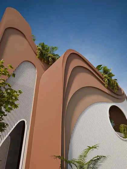 A close-up of the facade, showing the contrast between the smooth, curved surfaces and the textured, vertical panels.