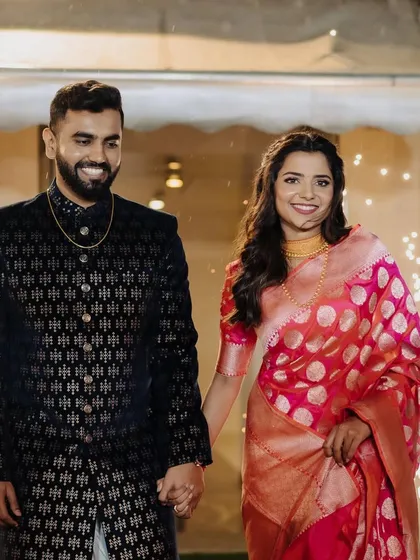The grand entry of the engaged couple. The bride's makeup is designed to be stunning and photogenic for these big moments.