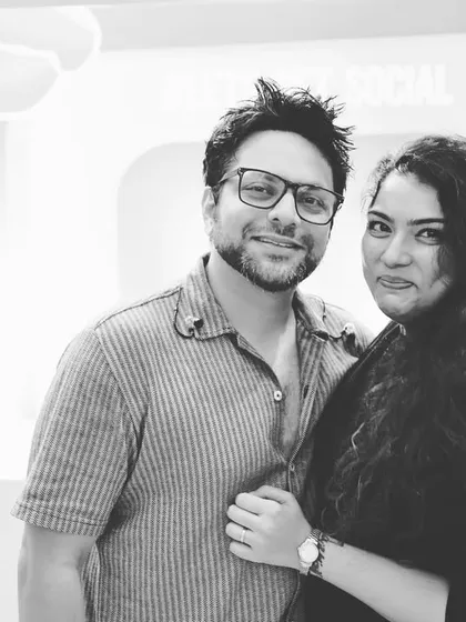 Dhruvi and Johaan posing at a corporate social event. We're not just performers; we're professionals who understand the networking and social aspects of corporate functions.