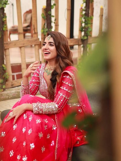 A candid moment of laughter. The makeup is designed to look beautiful and stay put, even through the most joyous moments.