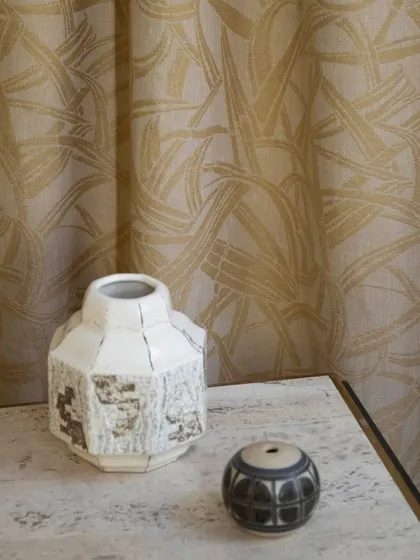 'Ami' by Nobilis is a tribute to artisanal heritage. This 100% hemp semi-sheer curtain is intricately woven to reflect the enduring elegance of Japanese bamboo basketry, adding a light and natural texture to the room.