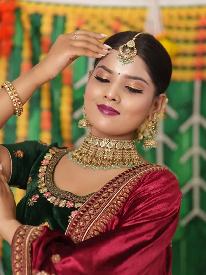 I love helping clients create unique looks. This bride chose a mint-green Kundan choker and matching earrings for her sangeet, showing how you can mix traditional styles with modern color palettes.