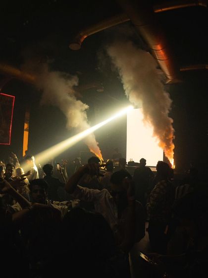 A moody shot from a club in Hyderabad, with CO2 cannons adding to the dramatic atmosphere.