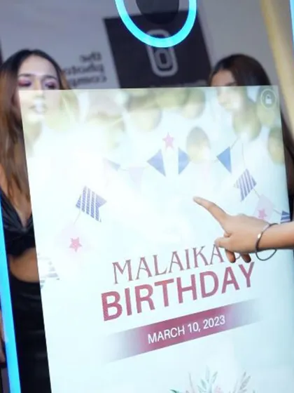 The Magic Mirror features a fully customizable touchscreen interface. We can brand the start screen with your event name, logo, or birthday message, as shown here.