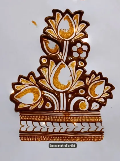 A beautiful lotus bouquet motif, perfect for a wrist or arm band.