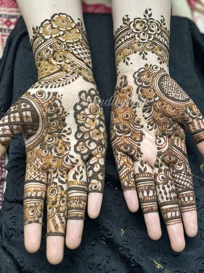 Intricate Full Hand Mehendi photo 22