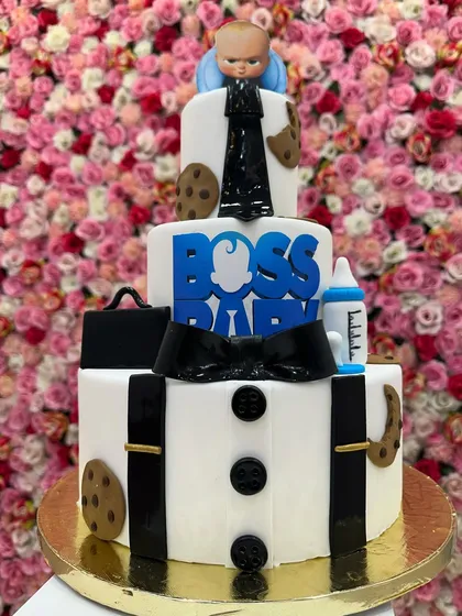 For the little boss in your life, this three-tiered Boss Baby themed cake is a showstopper. I used fondant to create sharp details like the suit, tie, and briefcase, making it a hit at kids' birthday parties.