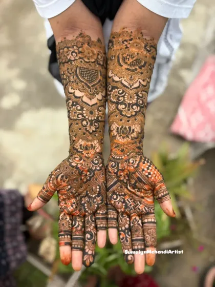 A look at the beautiful, rich stain of a full bridal henna design. The contrast between the detailed lines and the filled in elements really comes to life once the organic henna paste develops.